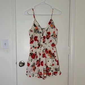 Sienna Sky floral romper with ruffle hem, size XS!
